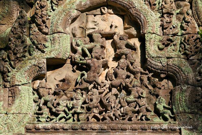 Carved pediment frantic tangled dancers Thommanon, Angkor, Cambodia