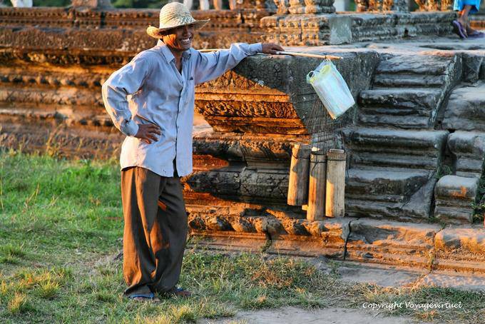 Glutinous rice seller on the site of Angkor Wat, Angkor, Cambodia