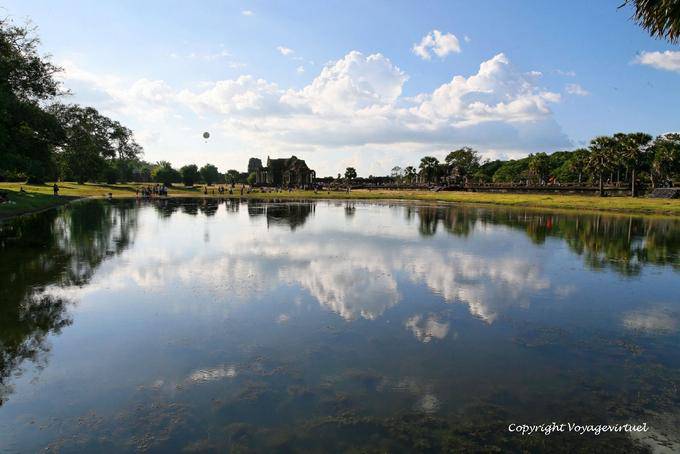 Reflections of the sky in a pool, and bookstores, Angkor Wat, Angkor, Cambodia