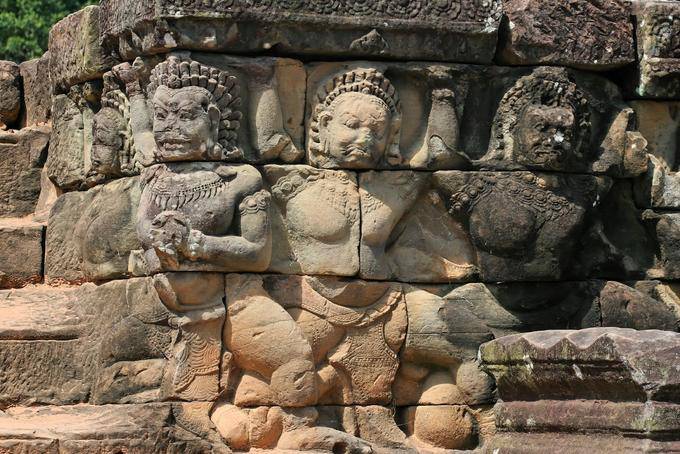 Garuda in Atlantean position in the paneled wall, elephants Terrace, Angkor, Cambodia