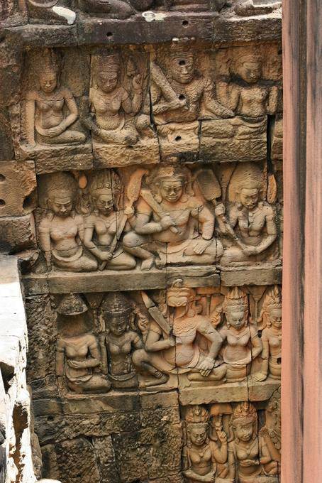 Relief frieze with women and armed men, Terrace of the Leper King, Angkor, Cambodia
