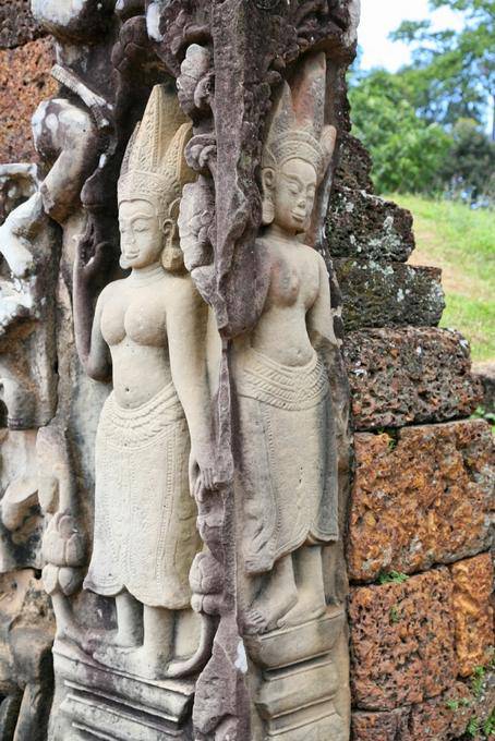 Devatas restored to a corner of the Terrace of the Leper King-Thom, Angkor, Cambodia