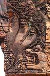 The three nagas in the mouth of kala, Banteay Srei, Cambodia.