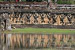 Atlanteans lions and Garuda in reflection, Elephants Terrace Thom, Cambodia.