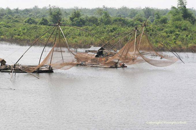Fishing nets (plaice) on the river, Phumi Chlong - Cambodia