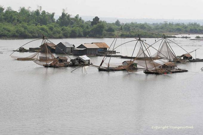 Floating village and old fishing nets, Mekong Chhlong - Cambodia