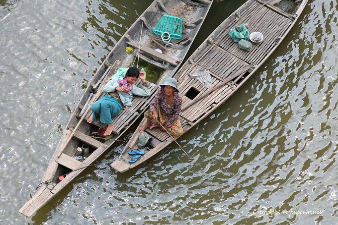 Typical wooden boats, Phumi Chhlong - Cambodia
