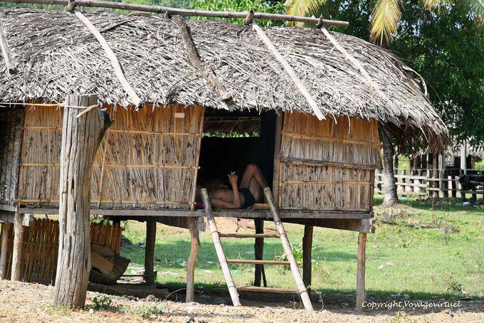 Peasant rest in his house, NH7 between Kratie and Kampong Cham - Cambodia
