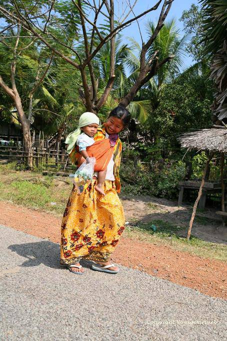 Woman female tradional dress and child NH7 - Cambodia