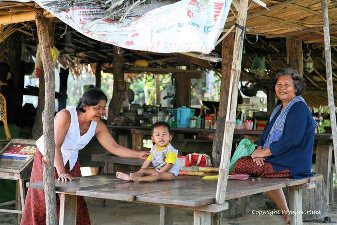 Smiles in a shop, N7 National Highway - Cambodia