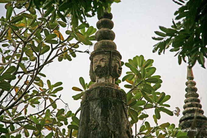 Sandstone peak surmounted by a Buddha head facing the cardinal points, Nokor Bachey, Kampong Cham - Cambodia