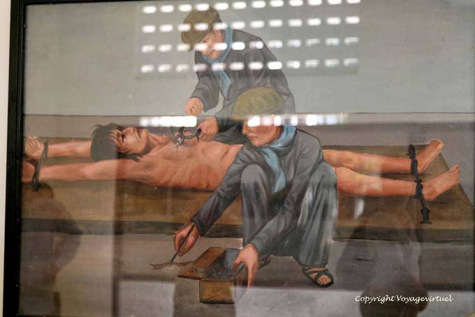 Representation of a torture scene with centipedes, Tuol Sleng, Phnom Penh - Cambodia