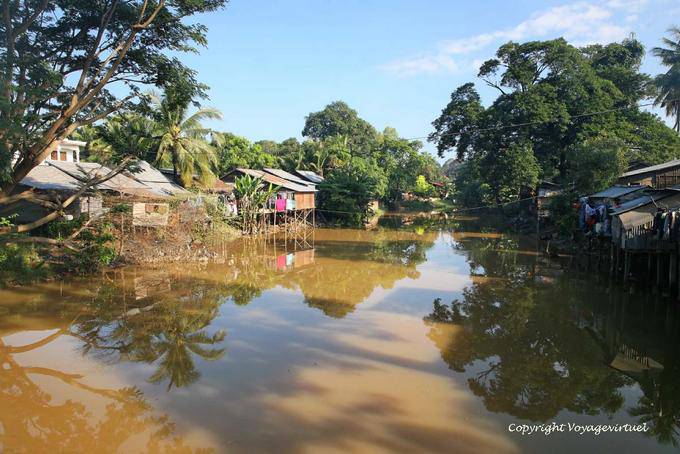 Reflections in the calm river Siem Reap - Cambodia