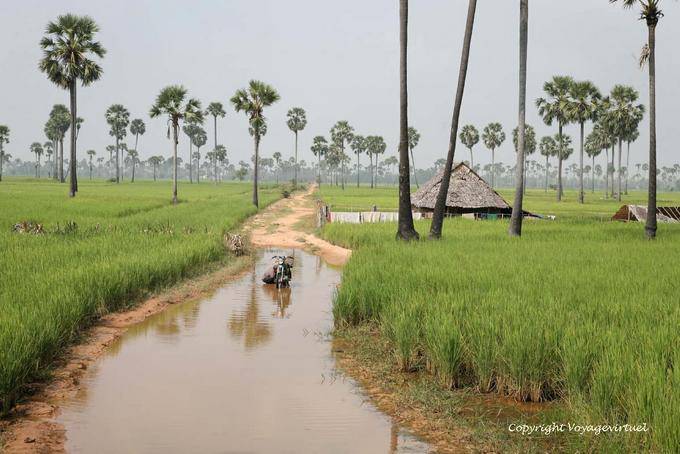 Repairs on the flooded road countryside to Skun - Cambodia