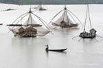 Fishing houseboats to flounder on the Mekong, Chhlong, Cambodia.
