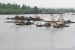 Floating village and old fishing nets, Mekong Chhlong, Cambodia.