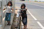 Gamines bike to the bridge of Kampong Cham Krong, Cambodia.