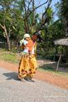 Woman female tradional dress and child NH7, Cambodia.