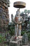 Shiva statue with four arms and armed with a club, Wat Nokor, Kampong Cham, Cambodia.