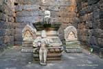 Statue of Decho Din Dam and stone altar Bachey Nokor Temple, Kampong Cham, Cambodia.