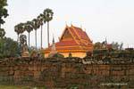 Wall laterite and sugar palms, Wat Nokor, Kampong Cham, Cambodia.