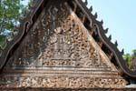 Wood sculpture on the facade of the Pagoda Roka Kandal Kracheh (Kratie), Cambodia.
