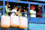 Children in a transport truck, Kracheh (Kratie), Cambodia.