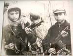 Very young Khmer Rouge, portrait of Genocide Museum, Phnom Penh, Cambodia.