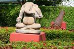 Ganesha sitting holding a radish in the right hand and a bowl in the left one, the National Museum, Phnom Penh, Cambodia.