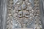 Wood carving, prayer, Museum Phnom Penh, Cambodia.