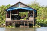 Nap in a hammock, Tonle Sap, Cambodia.