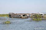Barge housing the largest freshwater river or Tonle Sap, Cambodia.