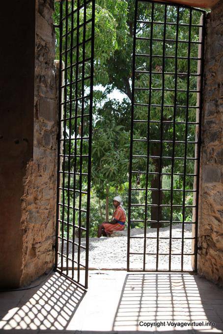 Santiago, Cidade Velha Igreja Sao Francisco Convento grids and woman - Cape Verde