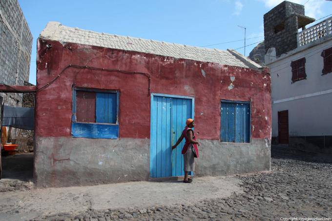 Santo Antão, Ponto do Sol, woman and colorful hut - Cape Verde