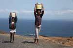 Fogo, Sao Jorge, carrying stones, Cape Verde.