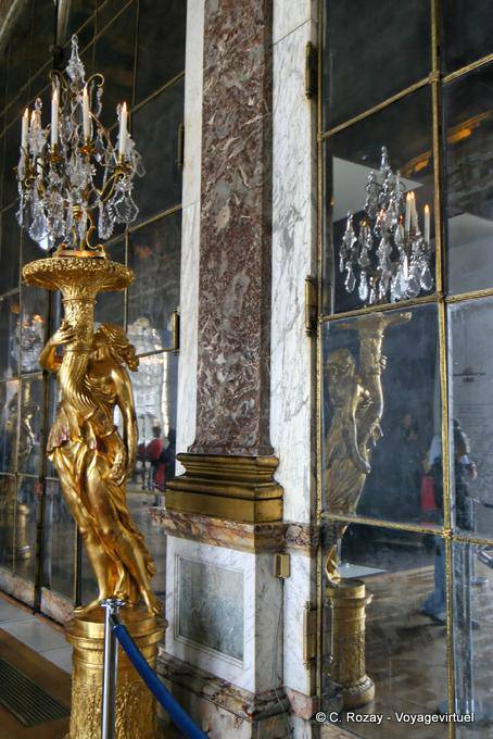 Hall of mirrors, reflecting golden flare, Versailles