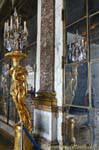 Hall of mirrors, reflecting golden flare, Versailles