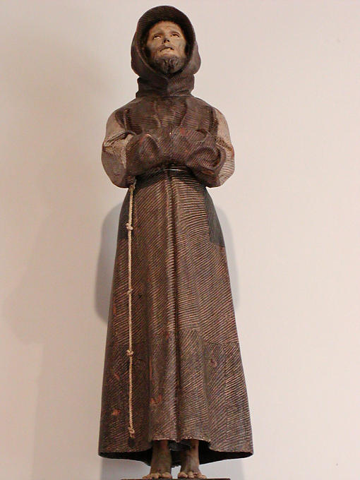 Wooden statue on display in the Gallery, Château de Villandry, France.