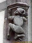 Detail of a wooden sculpture on the house Acrobats, Blois, France.