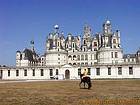 Cavalier in the courtyard, Castle of Chambord, France.