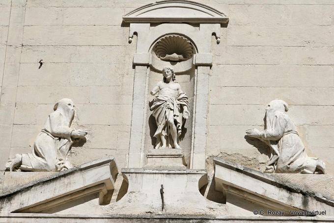 Penitents stone on the facade of the chapel of the White Penitents, Avignon, Provence, France