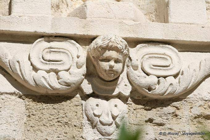 Angel carved on the facade of the White Penitents Chapel, Avignon, Provence, France