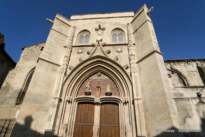 Facade and gates of St. Agricola church built in the fourteenth century, Avignon, Provence, France