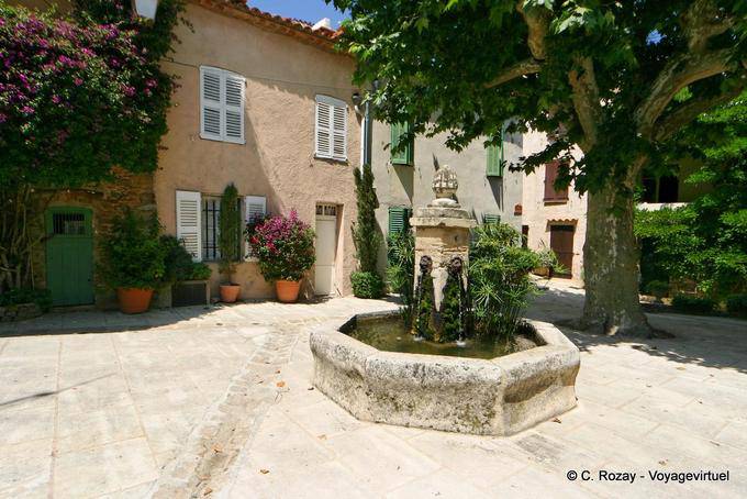 Grimaud, with octagonal fountain square, Provence, France
