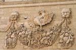 Sculptures on the right front of the Mint, Avignon, France.