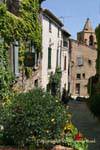 Grimaud, typical flower street, France.