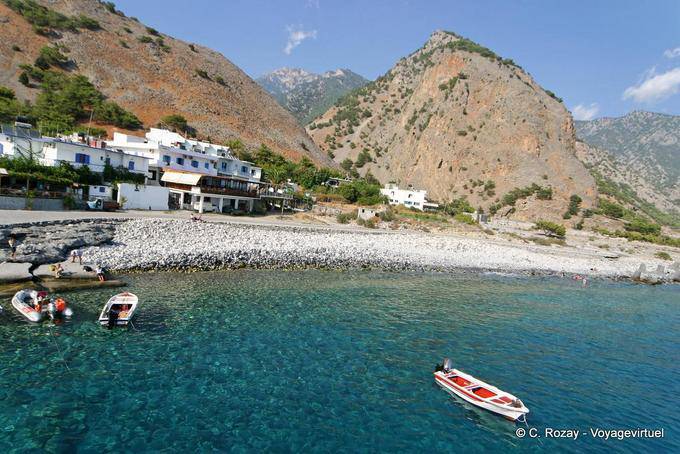 Agia Roumeli pebble beach for a swim at the end of the Samaria gorge trail - Crete, Greece
