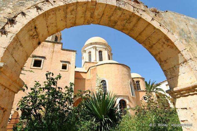 Church view from under an arch, Agia Triada Monastery Tzagarolon - Crete, Greece