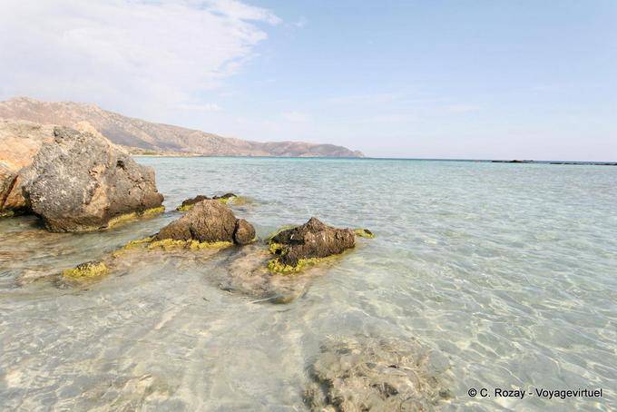 Colors of rocks in clear water, Elafonissi - Crete, Greece