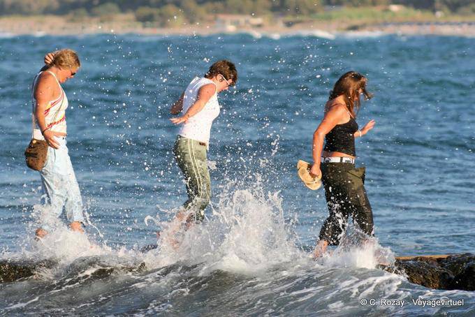 Dangerous passage on the dam leading to the chapel of Agios Nikolaos, Georgioupoli - Crete, Greece